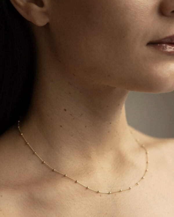 Dancing Dots Necklace, Brass